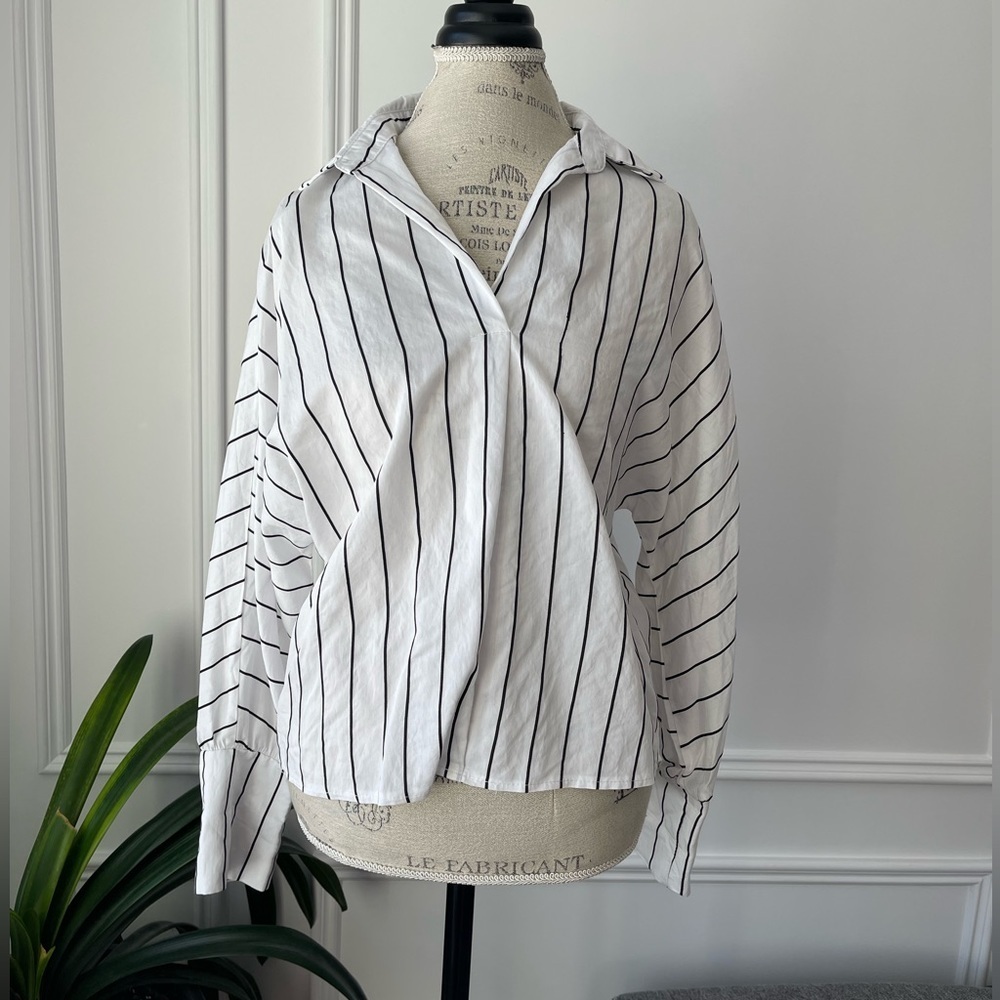 White long sleeve blouse with black vertical stripes
